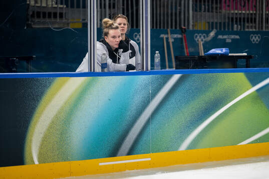Jenna Raunio and Mira Jungåker of Sweden at an ice hockey