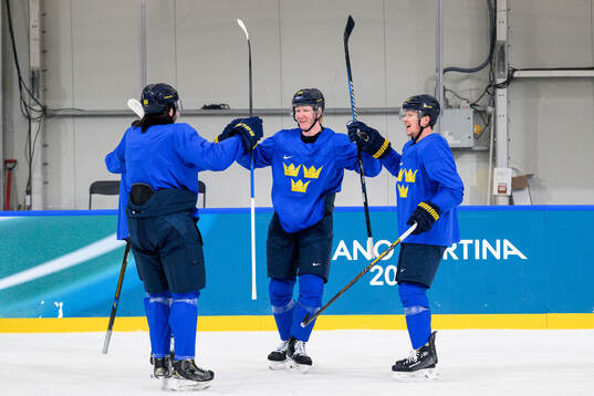 Mika Zibanejad, Rasmus Dahlin and Lucas Raymond of Sweden