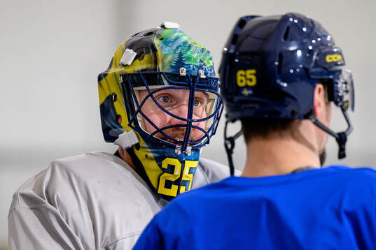 Goaltender Jacob Markström and Erik Karlsson of Sweden at