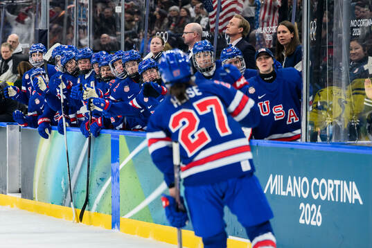 Taylor Heise of USA celebrate the 2-0 goal with the bench