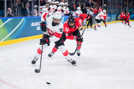 Nicole Vallario of Switzerland and Brianne Jenner of Canada