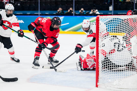 Emily Clark of Canada against Ivana Wey, Stefanie Wetli and