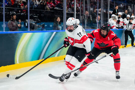 Laura Zimmermann of Switzerland and Renata Fast of Canada