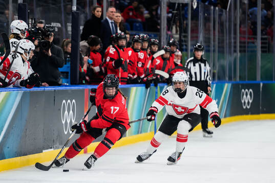 Ella Shelton of Canada and Alina Marti of Switzerland in