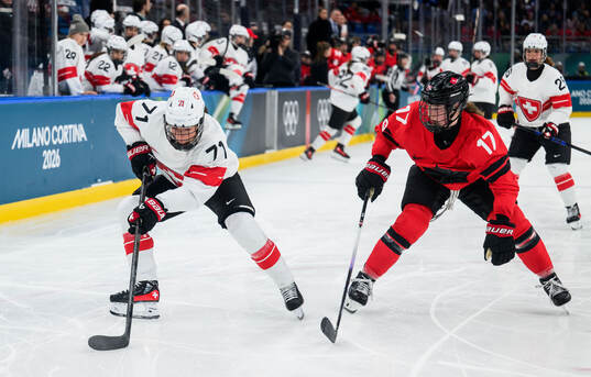 Lena Marie Lutz of Switzerland and Ella Shelton of Canada