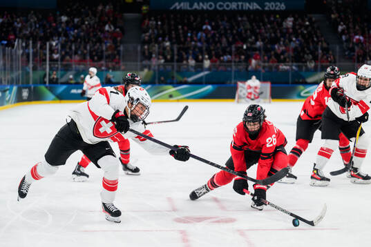 Lena Marie Lutz of Switzerland and Emily Clark of Canada in