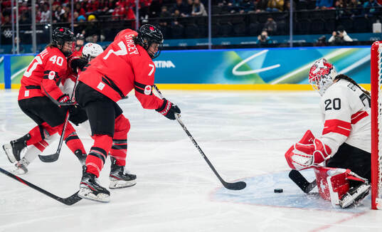 Laura Stacey of Canada against goaltender Andrea Braendli