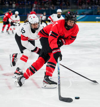 Alessia Baechler of Switzerland and Laura Stacey of Canada