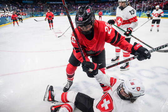 Emily Clark of Canada and Nicole Vallario of Switzerland in
