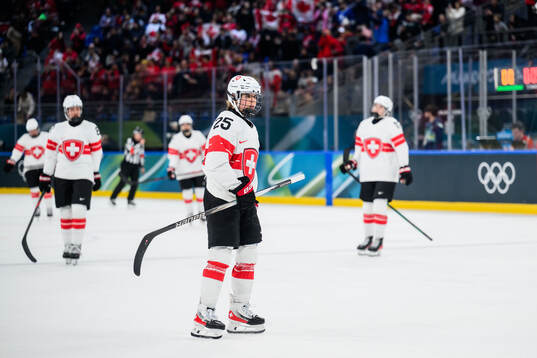 Alina Muller of Switzerland looks dejected