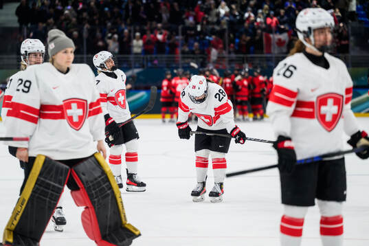 Alina Marti of Switzerland looks dejected