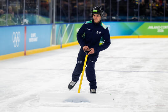 A volunteer in the men's ice hockey qualification playoffs