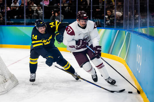 Joel Eriksson Ek of Sweden and Oskars Cibulskis of Latvia