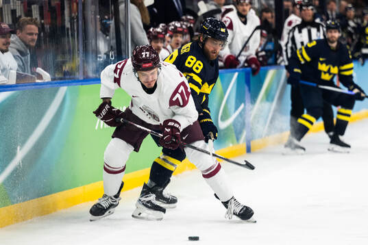 Kristaps Roberts Zile of Latvia and William Nylander of