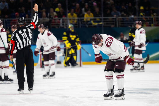 Uvis Janis Balinskis of Latvia looks dejected in the men's