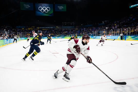 Filip Forsberg of Sweden and Martins Dzierkals of Latvia in