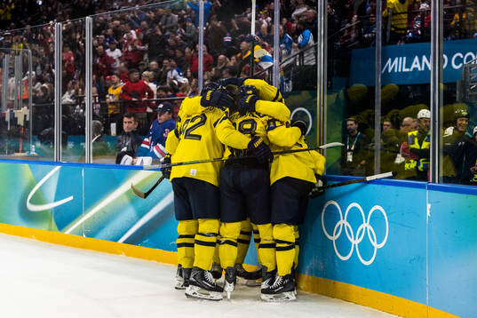 Players of Sweden celebrate