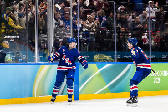 Quinn Hughes of USA celebrates