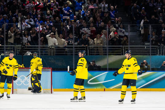 Gustav Forsling and Pontus Holmberg of Sweden look dejected