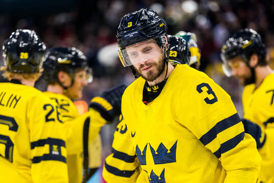Oliver Ekman-Larsson of Sweden looks dejected in the men's