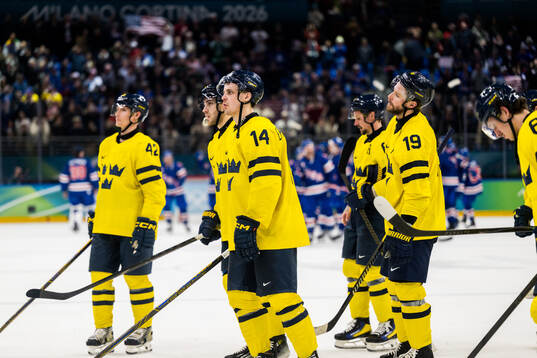 Joel Eriksson Ek and Adrian Kempe of Sweden look dejected