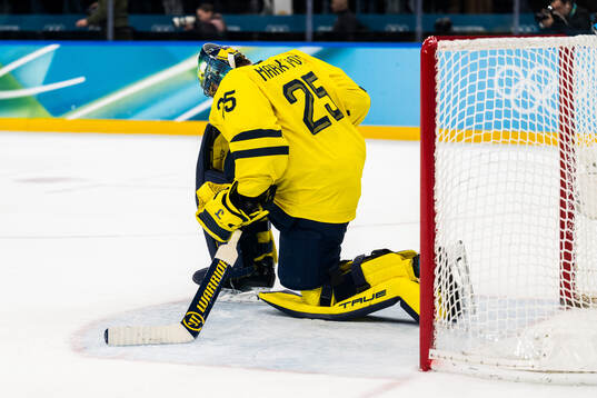 Goaltender Jacob Markström of Sweden looks dejected