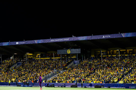Spectators in the stands at Aspmyra Stadion