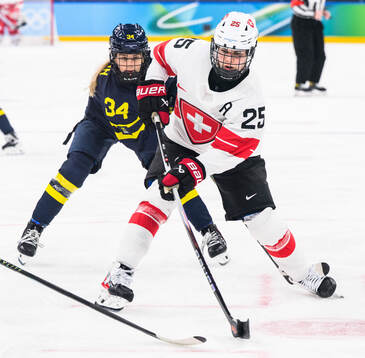 Mira Hallin of Sweden and Alina Muller of Switzerland in