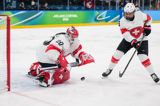 Goaltender Andrea Braendli and Shannon Sigrist of