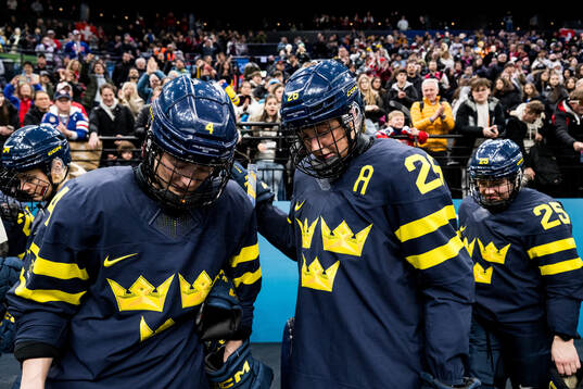 Linnea Andersson and Hanna Olsson of Sweden look dejected