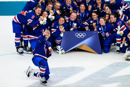 Megan Keller of USA takes a selfie of her teammates