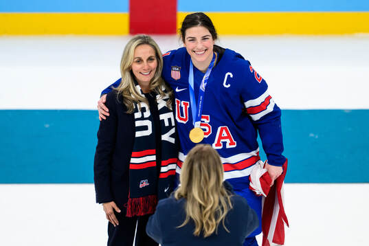 Ellen hughes and Hilary Knight of USA celebrate