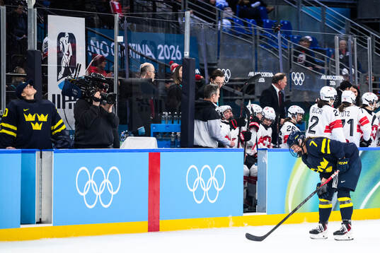 Mira Jungåker of Sweden in pain in the women's ice hockey