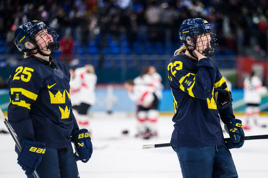 Lina Ljungblom and Thea Johansson of Sweden look dejected