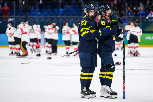Thea Johansson and Hilda Svensson of Sweden look dejected