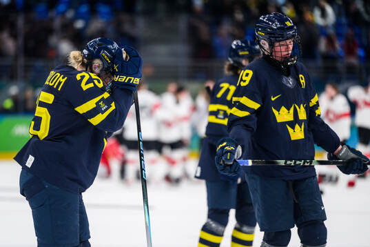 Lina Ljungblom and Sara Hjalmarsson of Sweden look dejected