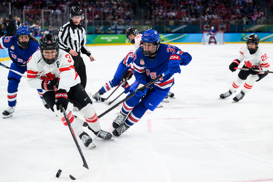 Jocelyne Larocque of Canada and Abbey Murphy of USA in the