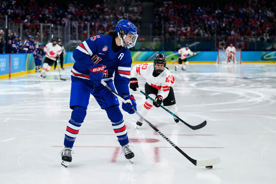 Megan Keller of USA and Kristin O'Neill of Canada in the