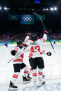 Kristin O'Neill of Canada celebrates