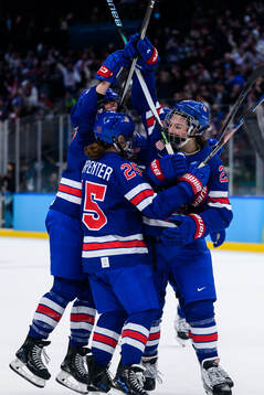 Hilary Knight of USA celebrate with teammates