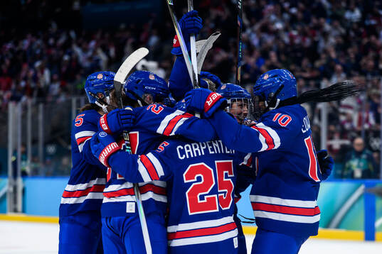 Hilary Knight of USA celebrate with teammates