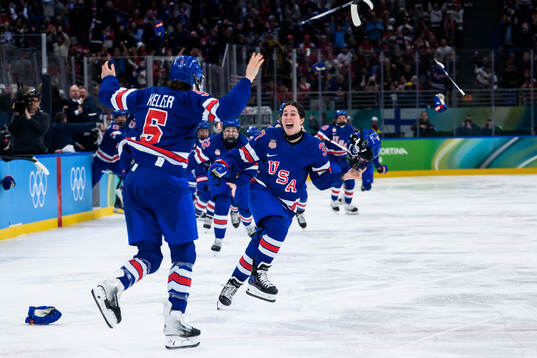 Megan Keller and Abbey Murphy of USA celebrate