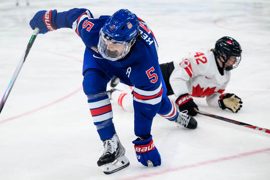 Megan Keller of USA celebrates
