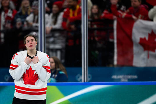 Daryl Watts of Canada looks dejected