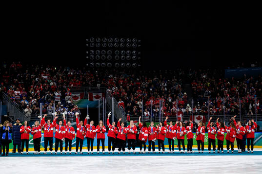 Team Switzerland celebrate as they are handed their bronze