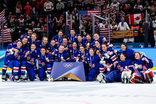 Team USA pose for a photo