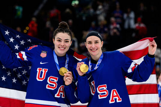 Joy Dunne and Hayley Scamurra of USA celebrate with their
