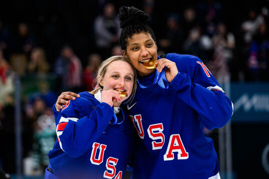 Kirsten Simms and Laila Edwards of USA celebrate with their