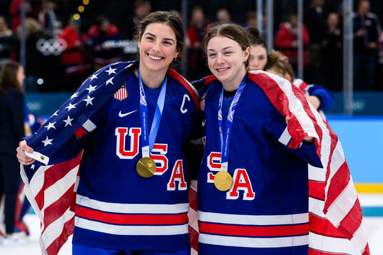 Hilary Knight and Tessa Janecke of USA celebrate with their