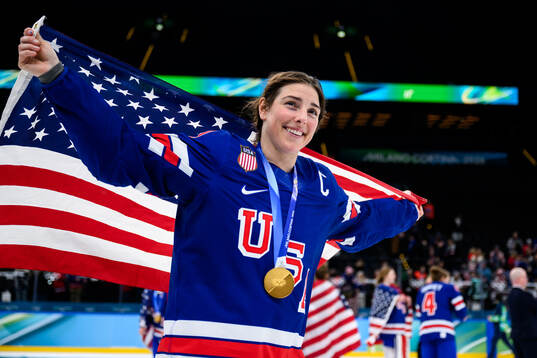 Hilary Knight of USA celebrates with her gold medal
